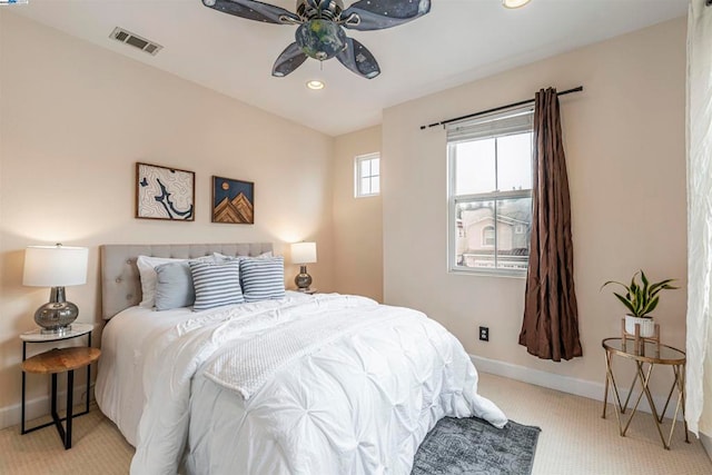 carpeted bedroom featuring ceiling fan