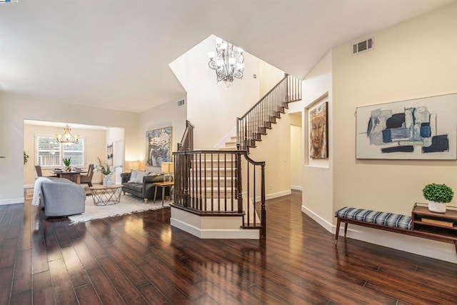 interior space with an inviting chandelier and hardwood / wood-style flooring