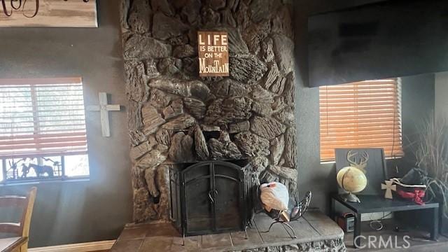 living room featuring a fireplace