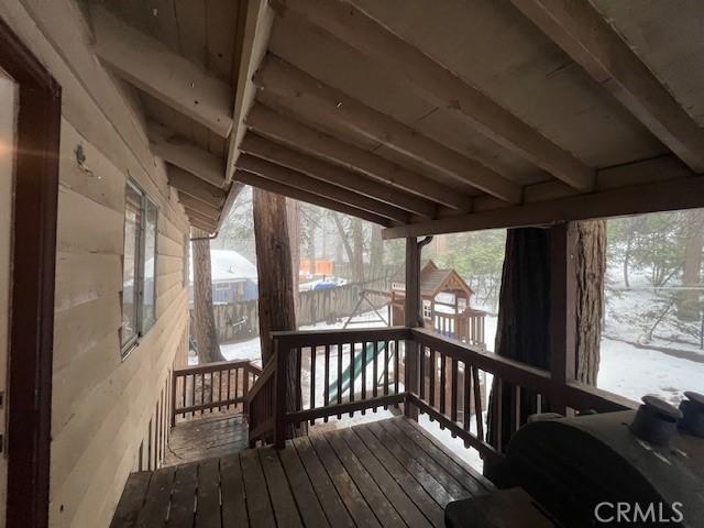 view of snow covered deck