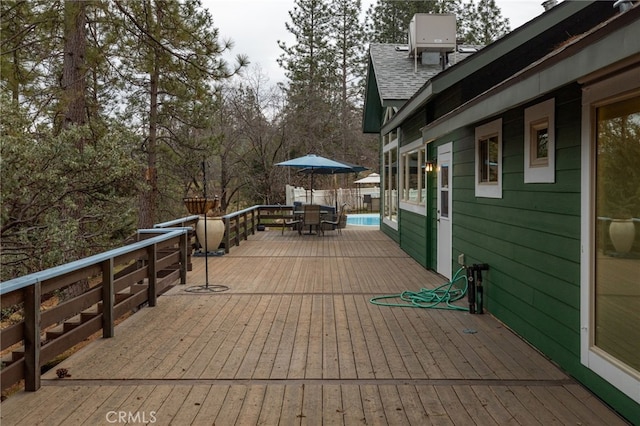 wooden terrace with central air condition unit