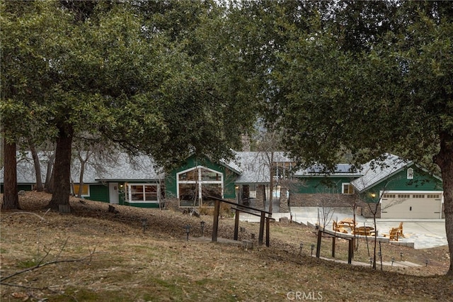 exterior space with a garage