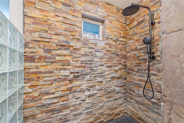 details with a tile shower