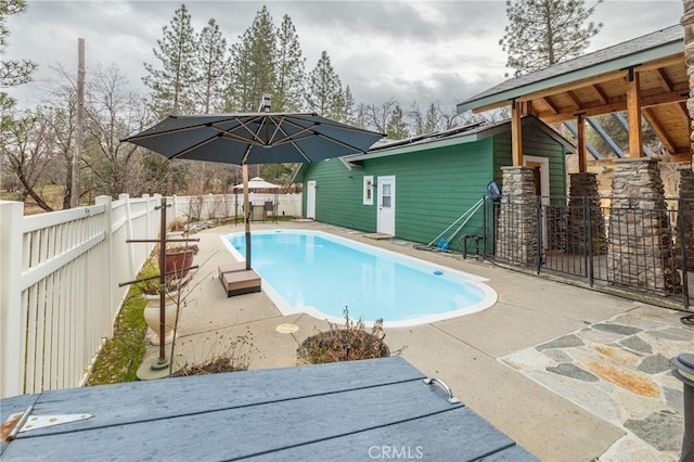 view of pool with a patio area