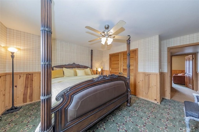 bedroom with ceiling fan and carpet floors