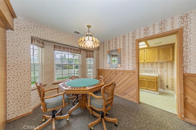 view of carpeted dining space