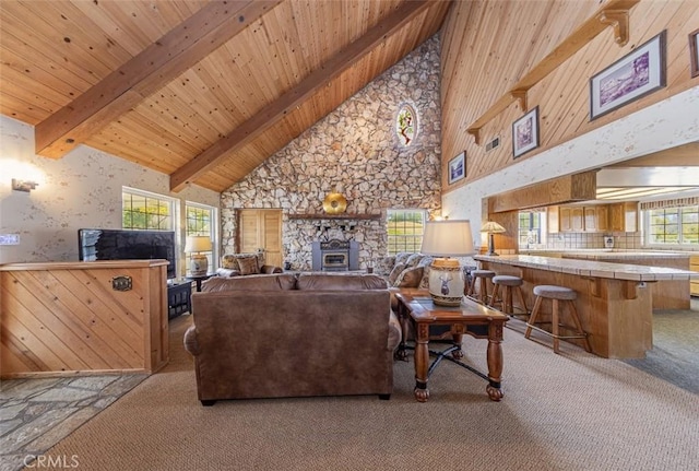 living room with light carpet, high vaulted ceiling, beamed ceiling, and wooden ceiling