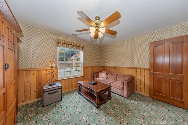 living room featuring ceiling fan