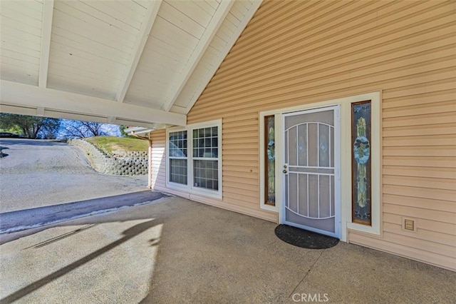 entrance to property with a patio area