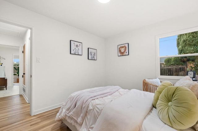 bedroom featuring light hardwood / wood-style floors