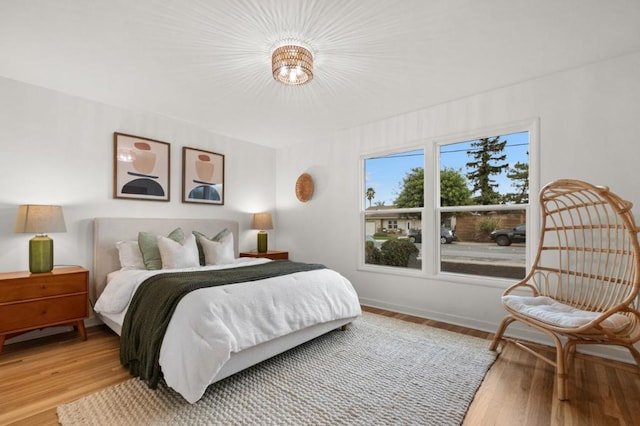 bedroom featuring wood-type flooring