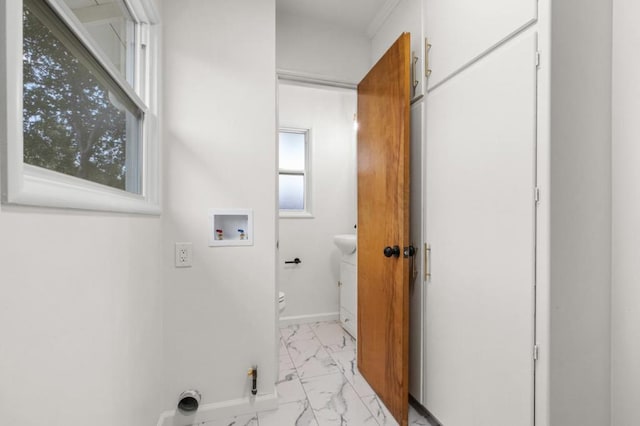 laundry room with hookup for a washing machine and hookup for an electric dryer