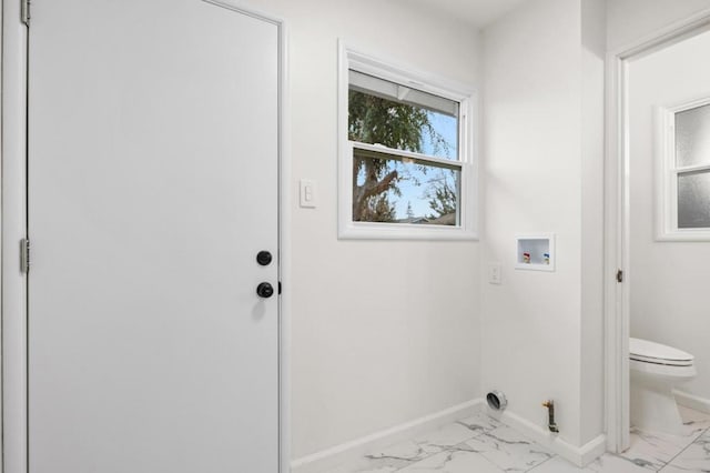 laundry room with hookup for a gas dryer and hookup for a washing machine