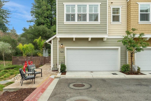 view of front of home with a garage