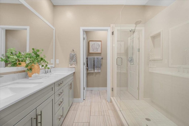 bathroom featuring vanity and walk in shower