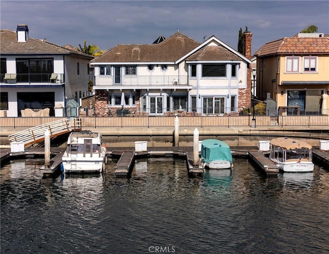 dock area with a water view