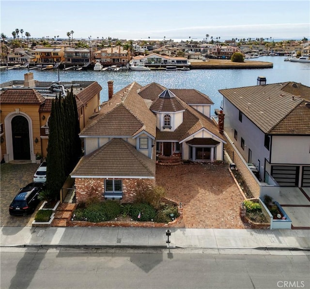 aerial view featuring a water view