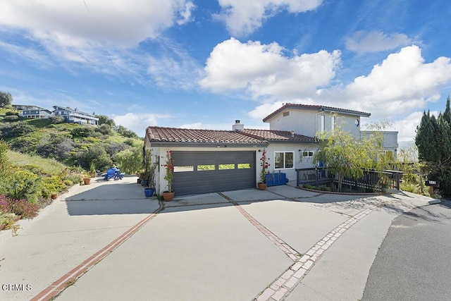 542 San Clemente Way, Camarillo, CA 93010 - mediterranean / spanish-style house featuring a tile roof, driveway, a garage, a chimney, and stucco siding