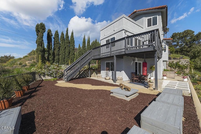 542 San Clemente Way, Camarillo, CA 93010 - back of house featuring stairway, a deck, a patio area, and stucco siding