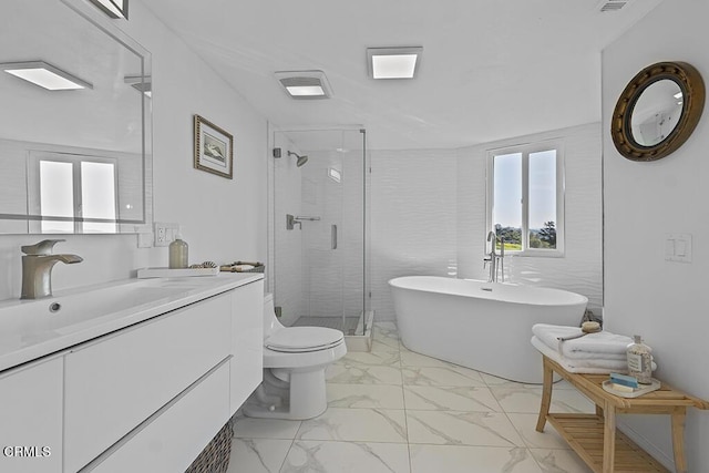 542 San Clemente Way, Camarillo, CA 93010 - full bathroom featuring marble look tile flooring, a stall shower, vanity, and a soaking tub