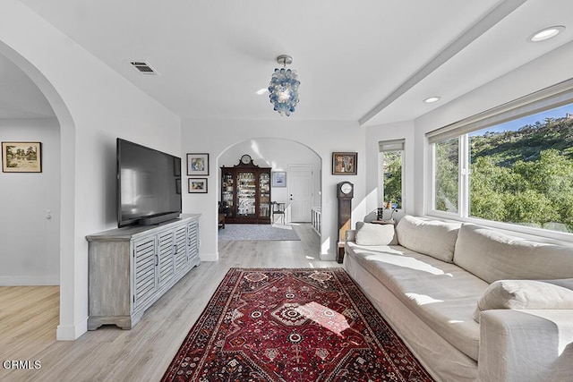 542 San Clemente Way, Camarillo, CA 93010 - living area featuring arched walkways, light wood-style floors, and recessed lighting