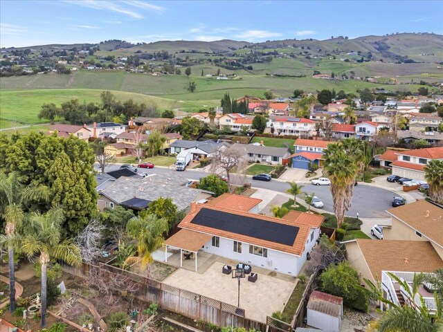 drone / aerial view featuring a mountain view