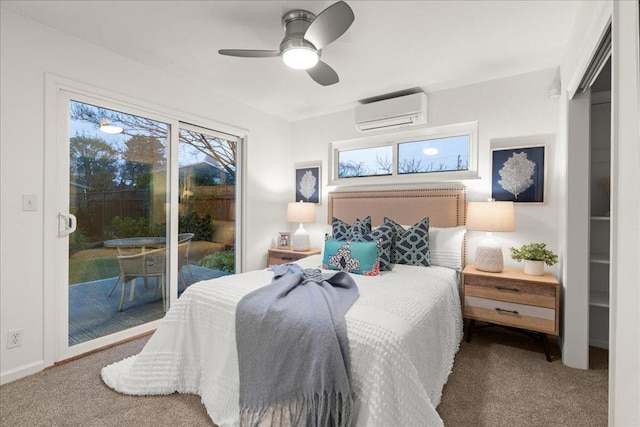 bedroom with multiple windows, access to outside, an AC wall unit, and carpet flooring