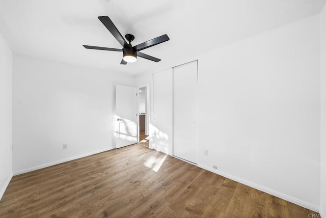 interior space with hardwood / wood-style flooring and ceiling fan