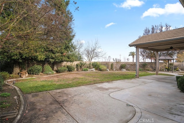 view of patio / terrace with a gazebo and ceiling fan