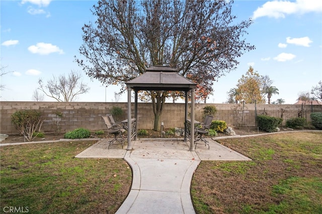 view of yard with a gazebo and a patio