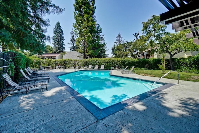 view of pool featuring a patio area