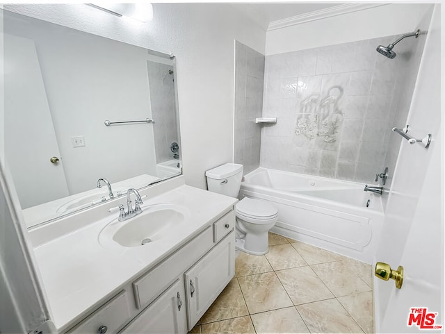 full bathroom with tile patterned floors, toilet, crown molding, vanity, and tiled shower / bath combo