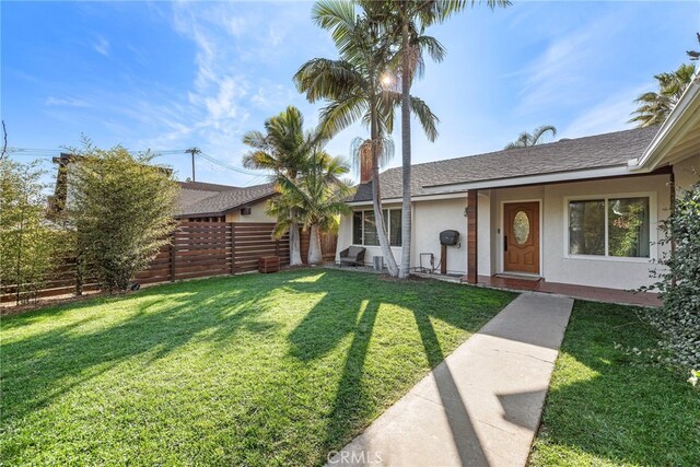 exterior space featuring a front yard