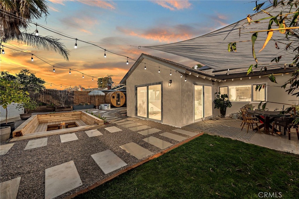 view of patio terrace at dusk