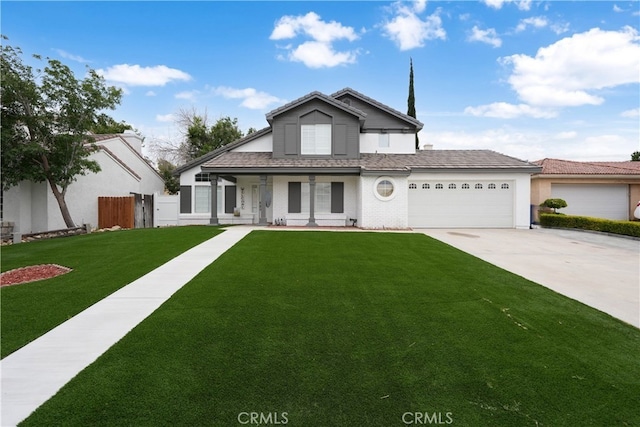 view of front of property with a garage and a front yard