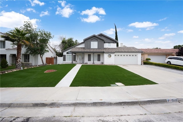 view of front facade featuring a garage and a front yard