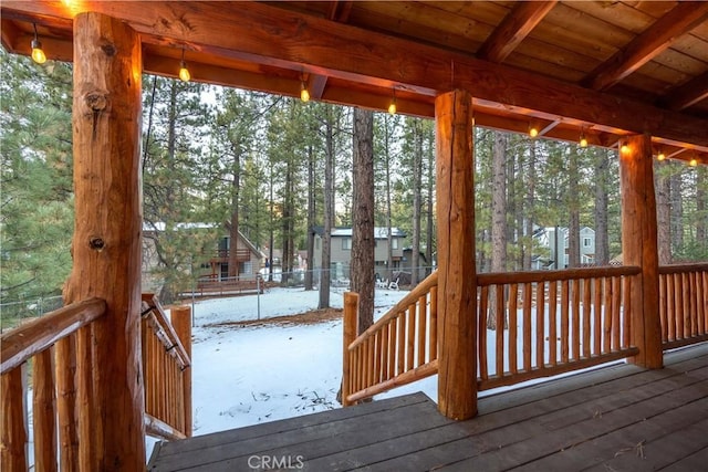 exterior space featuring beam ceiling