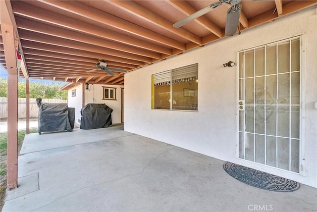 view of patio / terrace with area for grilling and ceiling fan