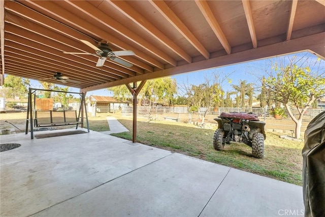 view of patio featuring ceiling fan