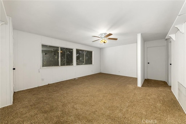 unfurnished bedroom featuring a ceiling fan and carpet flooring