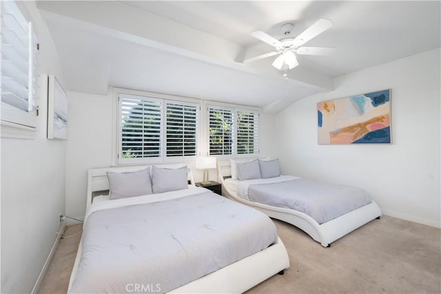 bedroom with light carpet, lofted ceiling with beams, and ceiling fan