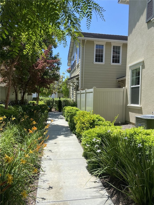 view of home's exterior with cooling unit