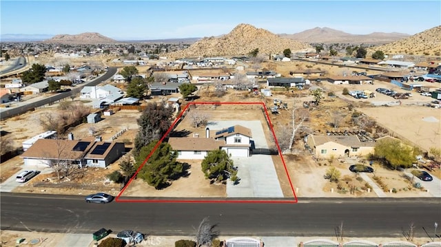 drone / aerial view featuring a mountain view