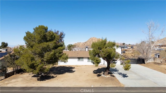 view of front of home with a mountain view