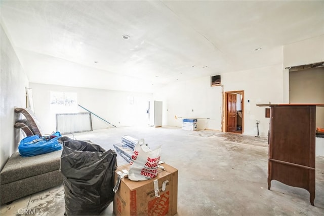 living room featuring concrete flooring