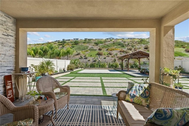 balcony featuring a patio area