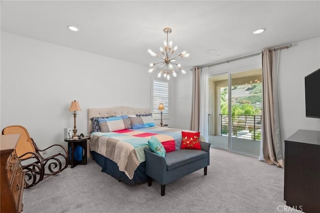 carpeted bedroom with a notable chandelier and access to exterior