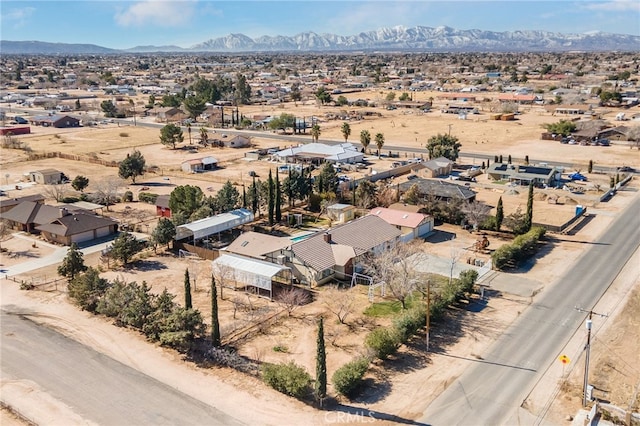 bird's eye view with a mountain view