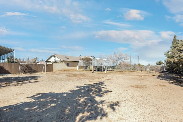 view of yard with a carport