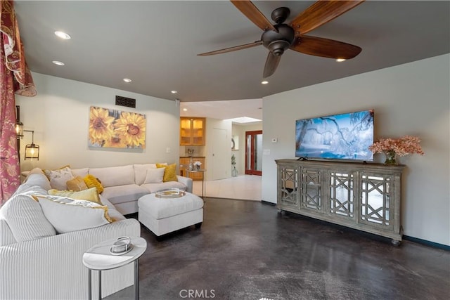 living room with ceiling fan